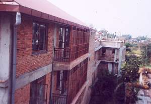 Looking west on the north side of the Maryama building.