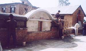 Tibetan prayer wheel wall