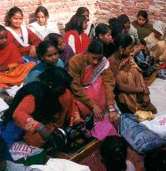 Women learning sewing