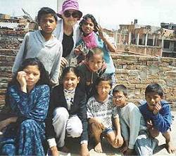 Sheila Dantzer with kids on the roof